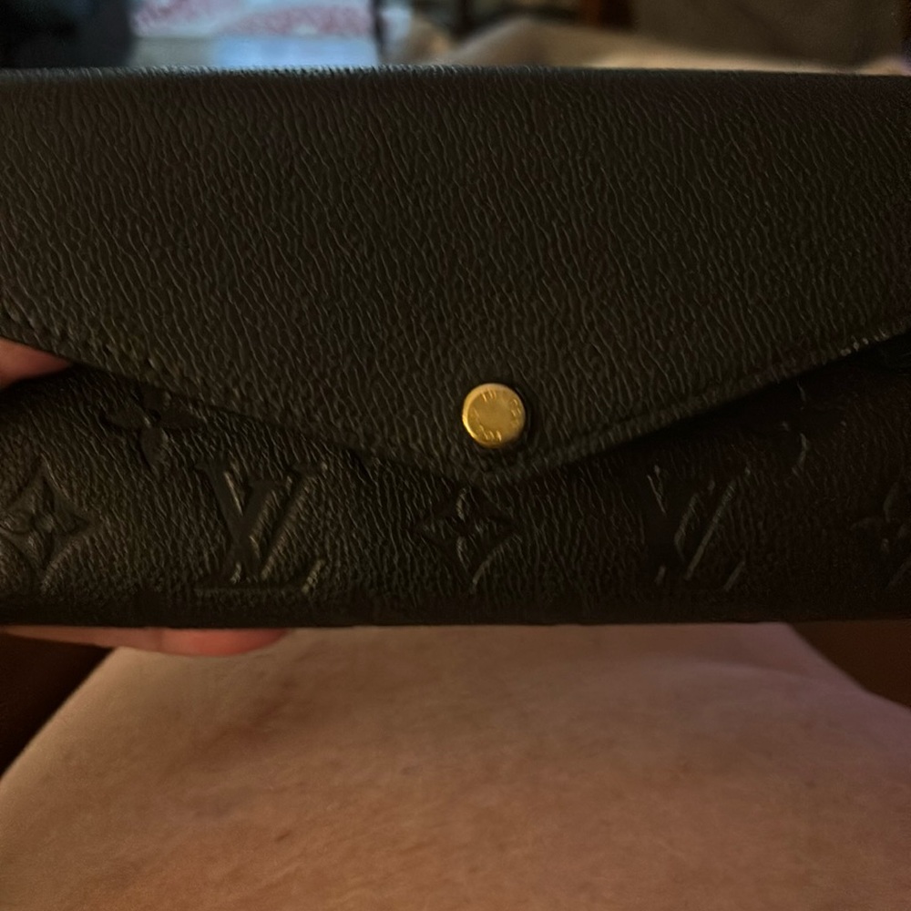 Louis Vuitton Black long wallet.